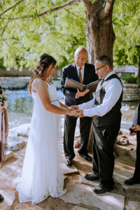 Everlasting Elopements couple during their wedding ceremony with their wedding officiant