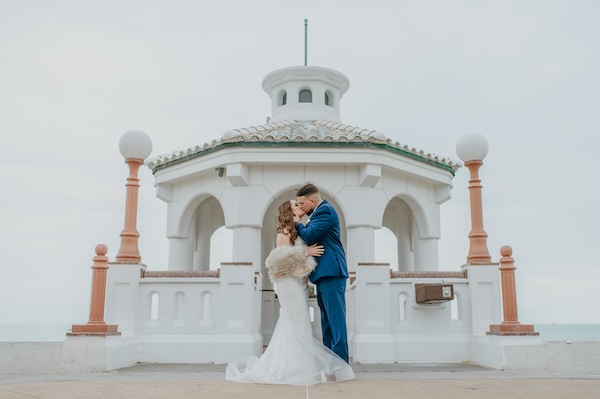 Everlasting Elopements couple standing in front of Miradores gazebo kissing after wedding ceremony